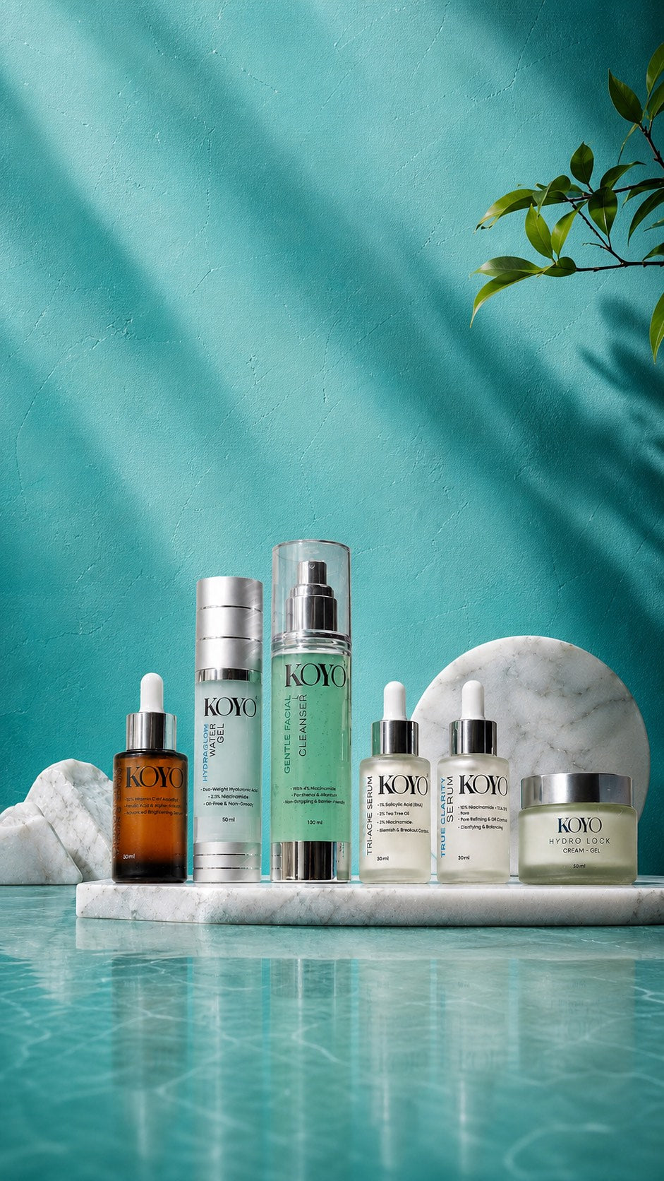 KOYO Beauty six-product skincare range on turquoise marble